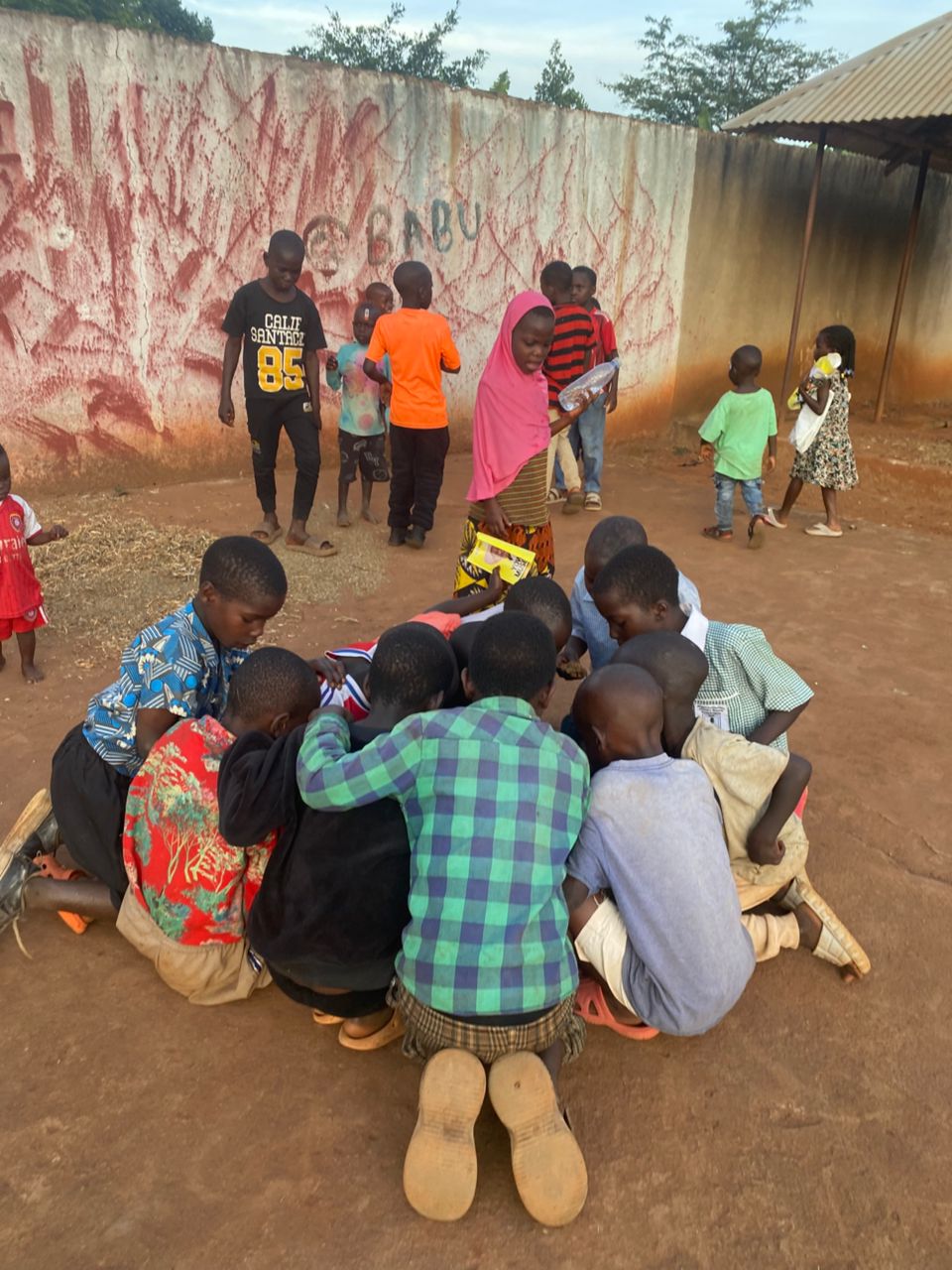 Children and community members gathered for an educational session