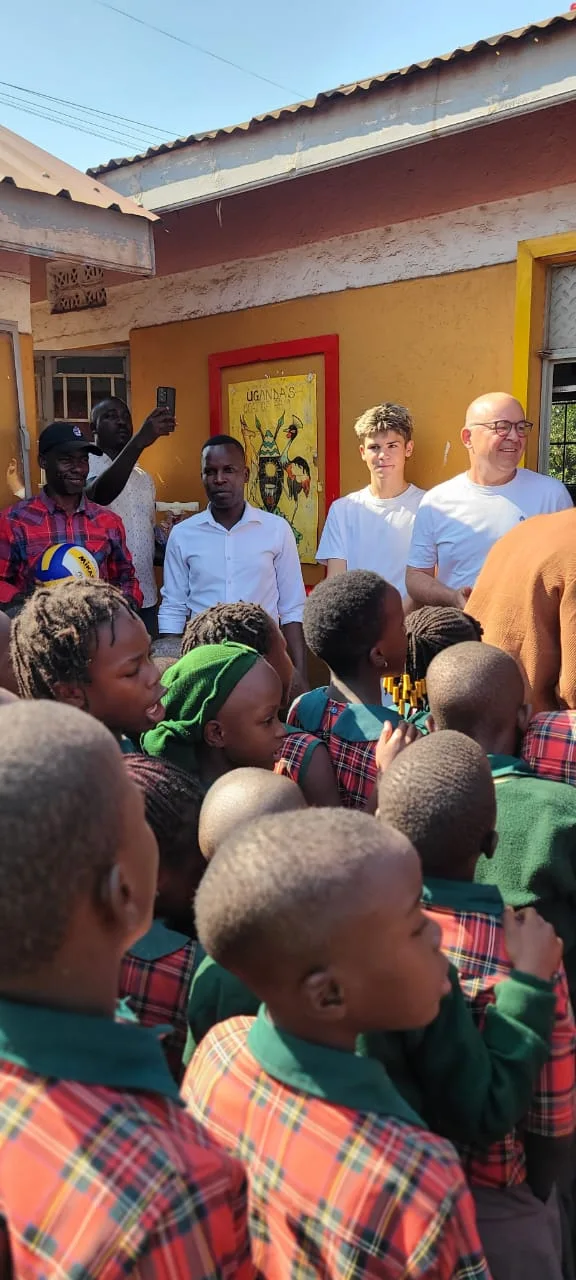 Handing over donations — School assembly
